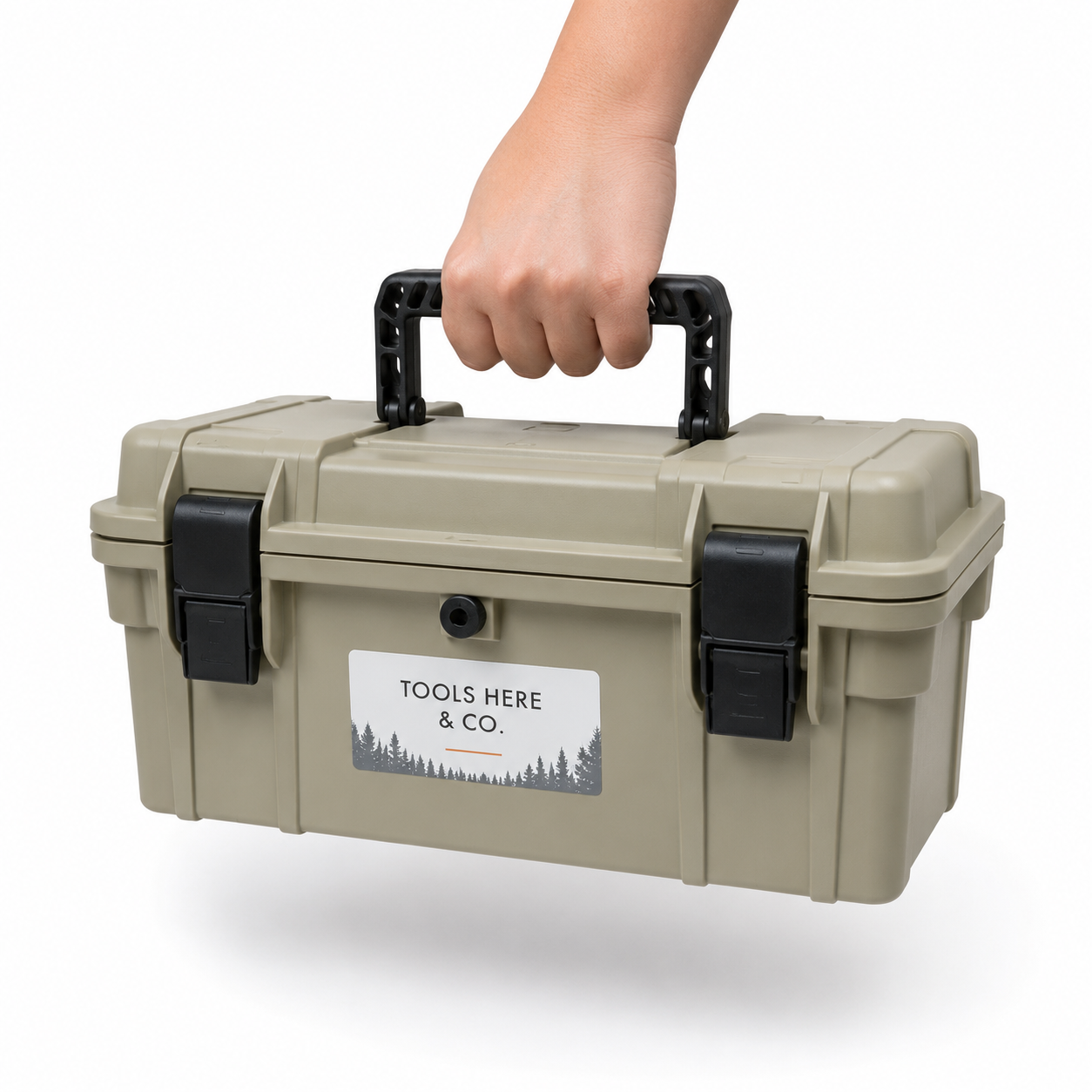 Hand carrying the 18-inch rubber-sealed toolbox in olive by the fold-flat handle